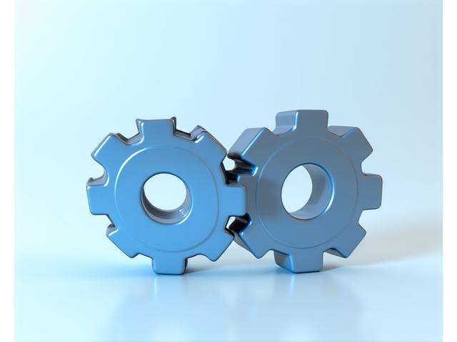 Abstract stylized image of two gears interlocking, symbolizing partnership and collaboration.